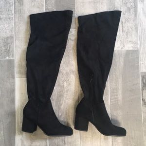 Tall light suede black boots